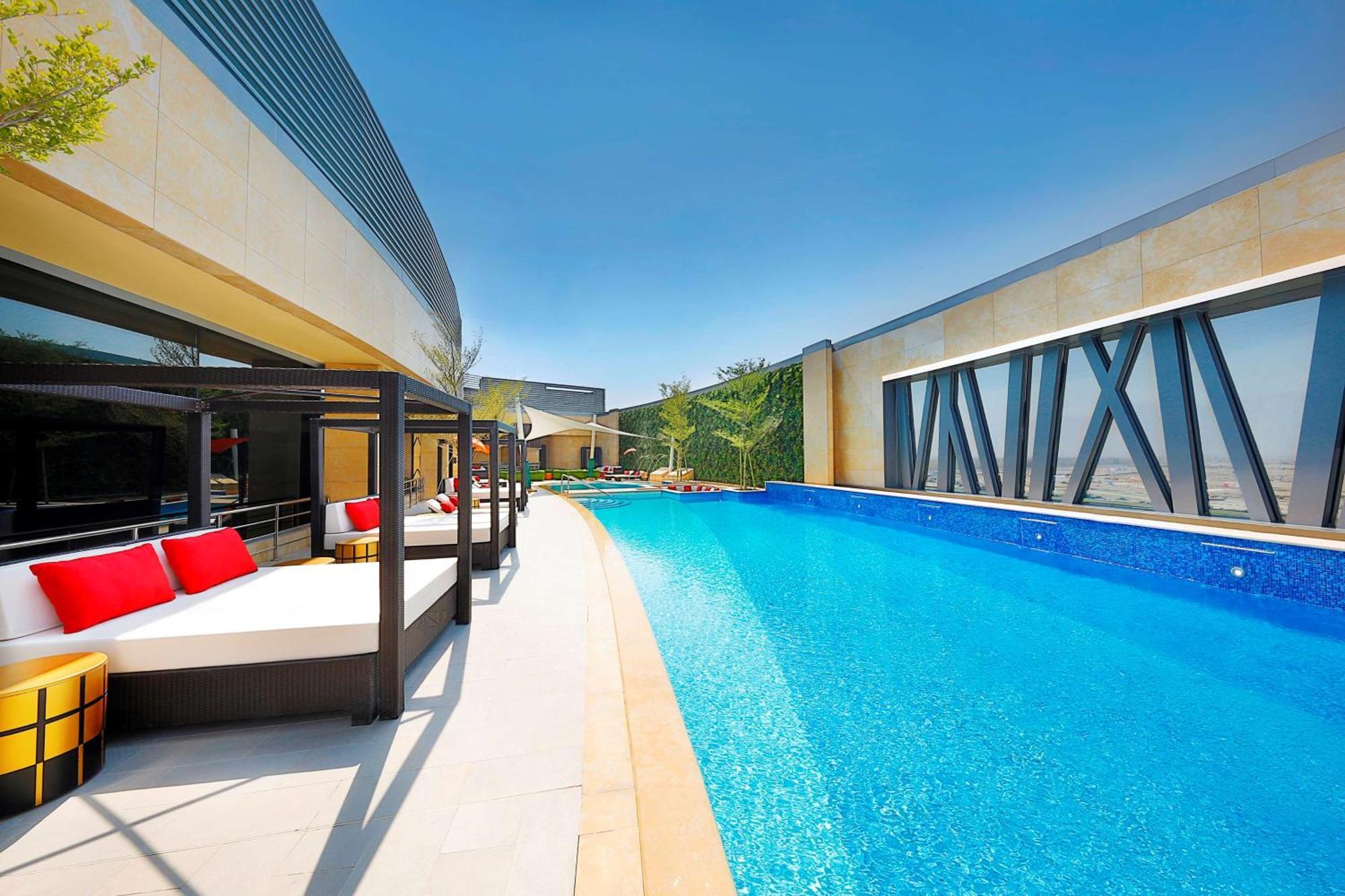 Alrayyan Hotel Doha, Curio Collection By Hilton Al Rayyan Exterior foto The swimming pool at the 101 Sky Lounge